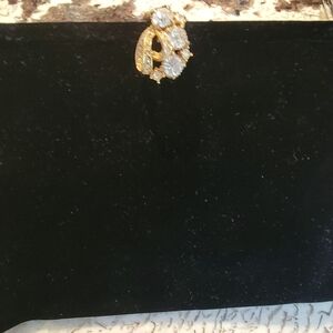 Elegant Black Clutch with Gold Accents